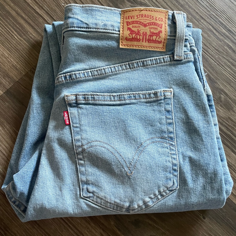 Levi's Light Blue Denim Jeans with Tan Leather Patch